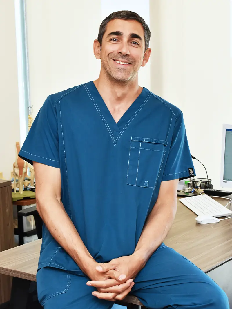 Dr. Carlos Reyes De Cáceres